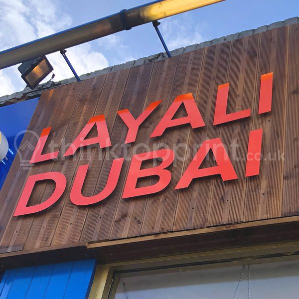 Orange aluminium letters