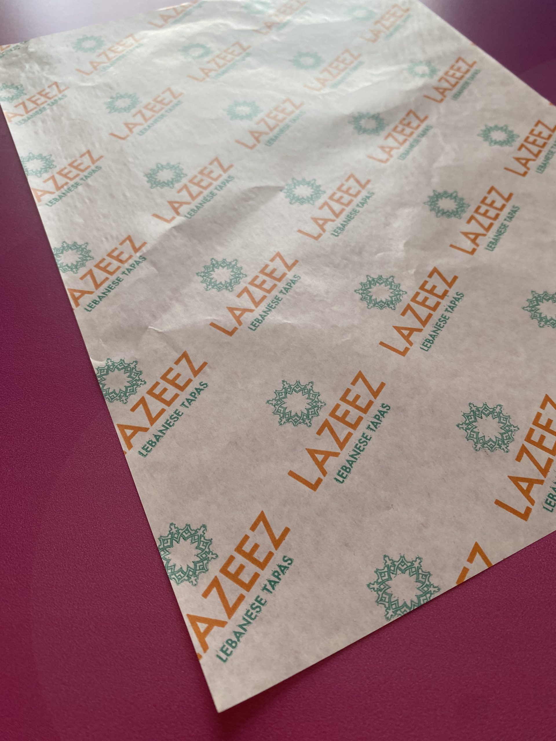 Branded grease paper sheets for restaurant